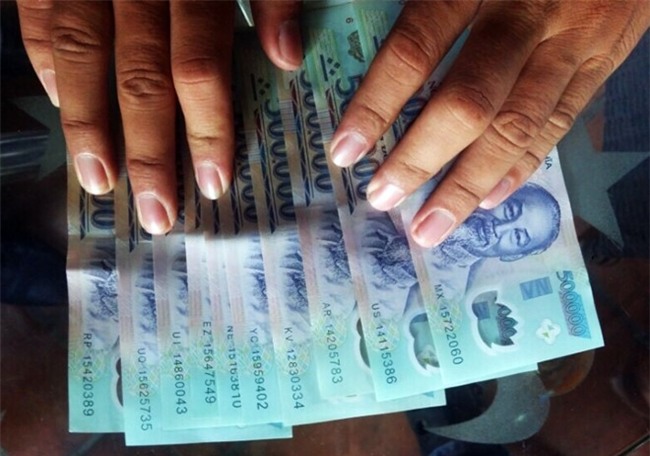 Nhat duoc tui xach, doi chu nhan 5 trieu dong tien chuoc hinh anh 2