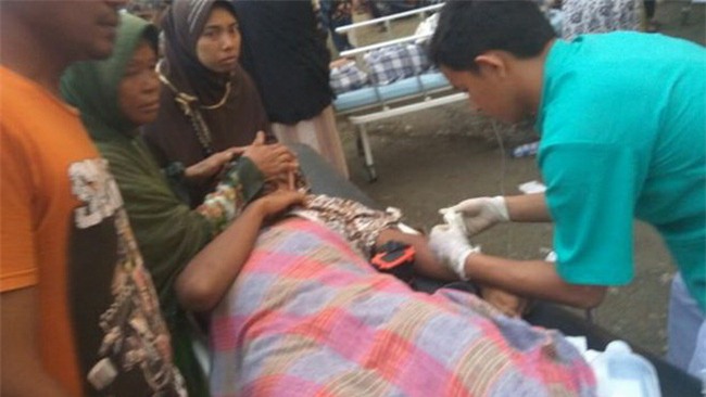 Indonesia động đất mạnh, ít nhất 18 người chết - Ảnh 2.