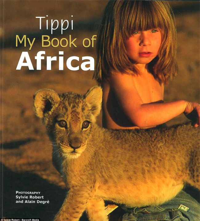 Cuộc sống của cô bé rừng xanh ngoài đời thật, làm bạn với voi châu Phi và chơi cùng báo - Ảnh 31.