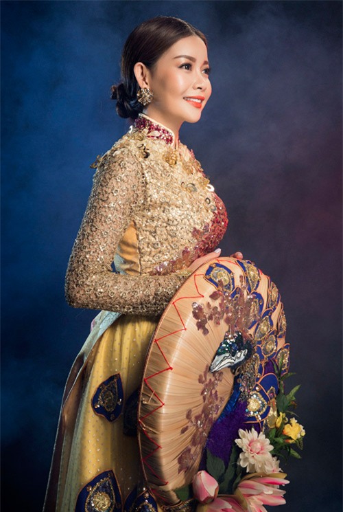 can canh ao dai chim cong long lay cua hoa hau hai duong - 2