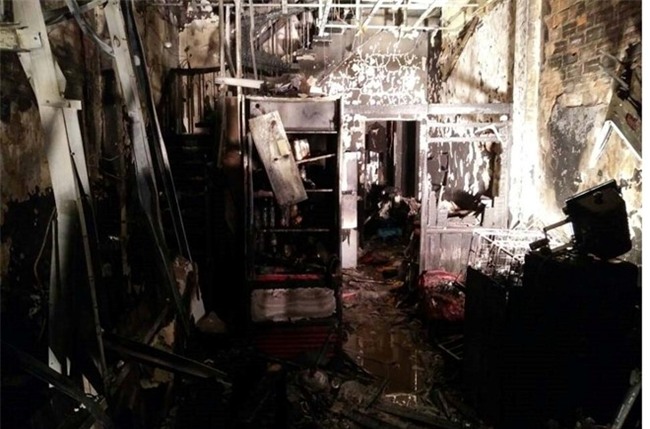 Bat luc nhin ca gia dinh chet chay trong quan ca phe Sai Gon hinh anh 1