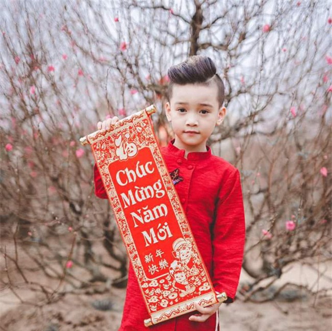 Khi các bé xúng xính trong tà áo dài ngày Tết, mẹ như thấy cả mùa xuân - Ảnh 18.