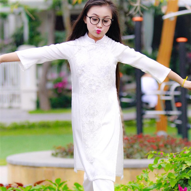 Khi các bé xúng xính trong tà áo dài ngày Tết, mẹ như thấy cả mùa xuân - Ảnh 32.
