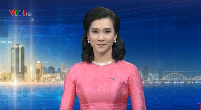 lo dien nu bien tap vien xinh dep moi toanh cua ban tin thoi su vtv1 hinh anh 2
