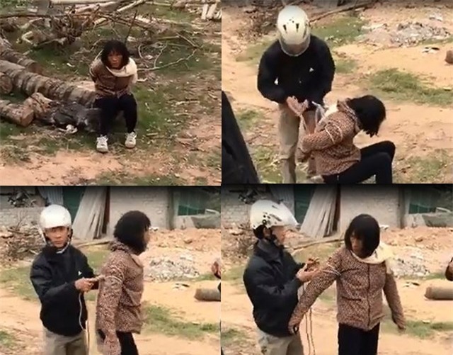 Người phụ nữ bị cho là bắt cóc trẻ em, người dân trói lại nhưng sau đó được cơ quan chức năng giải cứu (ảnh cắt từ clip)
