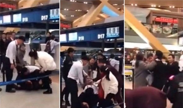 Khách Trung Quốc đánh nhân viên sân bay vì bị hoãn chuyến - Ảnh 1.