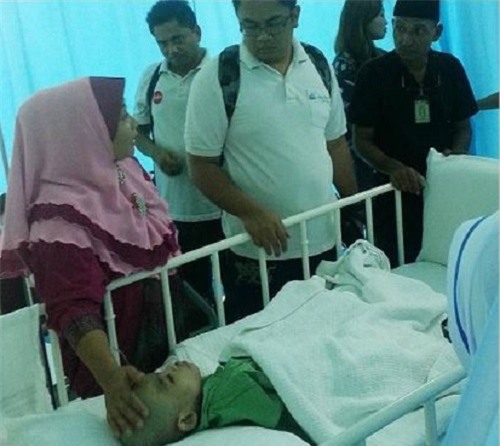 bi me nhot trong phong kin chi an phan va nuoc tieu, 7 nam sau cau be thay doi chong mat - 3