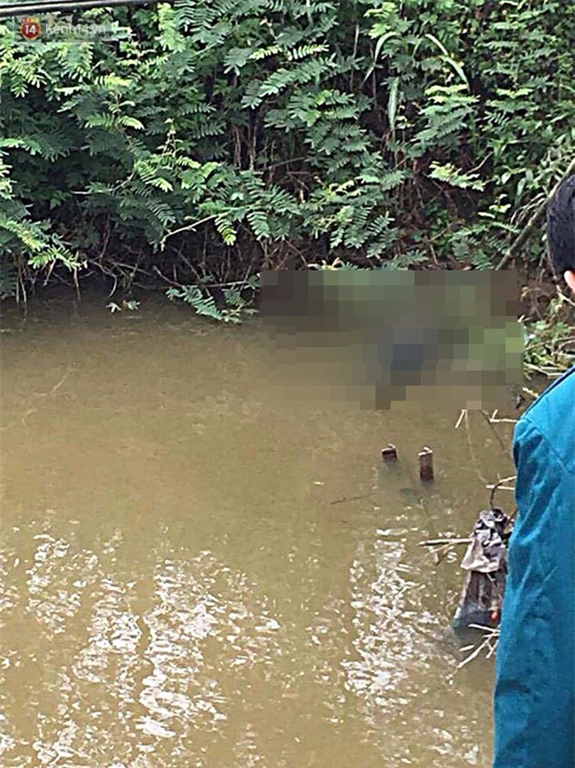 Phát hiện thi thể nam thanh niên 20 tuổi mặc áo mưa nổi dưới mương nước - Ảnh 1.