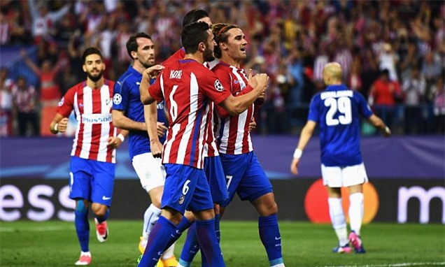 Các cầu thủ Atletico ăn mừng sau khi Griezmann (phải) sút phạt đền thành công