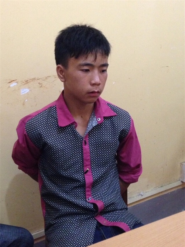 Nghi can Long Quang Vui tại cơ quan Cảnh sát điều tra.
