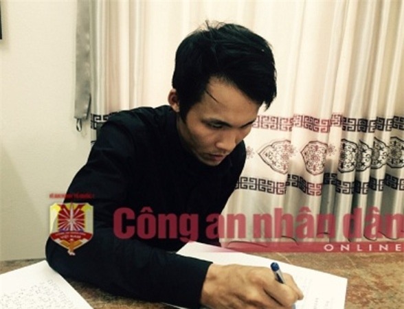 Đối tượng Quang tại cơ quan điều tra. Ảnh: X.Mai