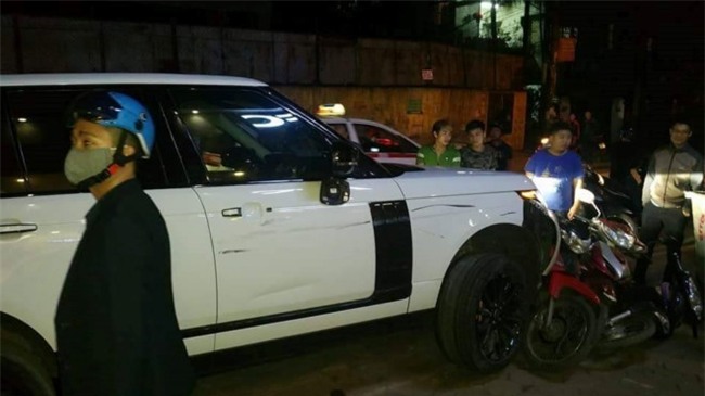 Range Rover gay tai nan lien hoan tren pho Ha Noi hinh anh 2