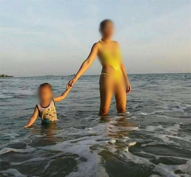 Truy tìm nguồn gốc bức ảnh người phụ nữ mặc bikini hở hang gây sốc trên bãi biển - Ảnh 2.