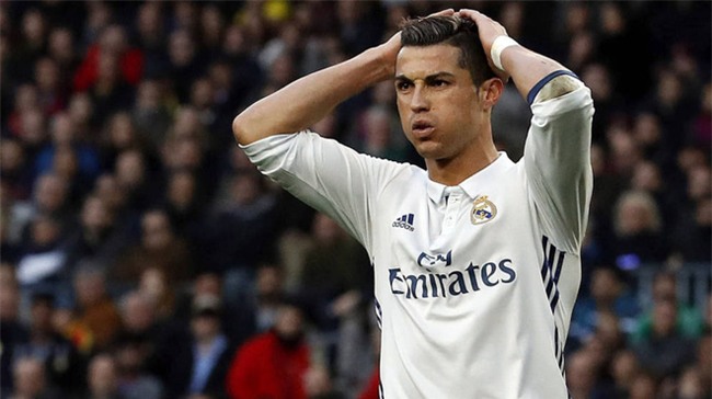 Ronaldo bị khiếu nại trốn thuế gấp 40 lần Messi - Ảnh 1.