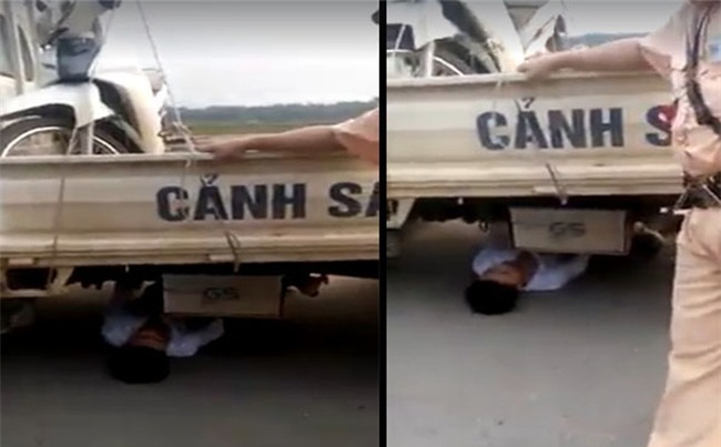 Bị tạm giữ xe do vi phạm giao thông, nam thanh niên chui vào gầm xe ôtô CSGT 