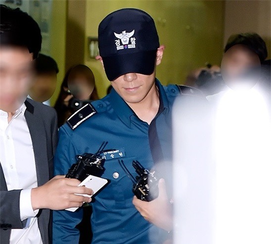 Vi sao T.O.P phai uong thuoc an than con Minh Beo ung dung di dien? hinh anh 1