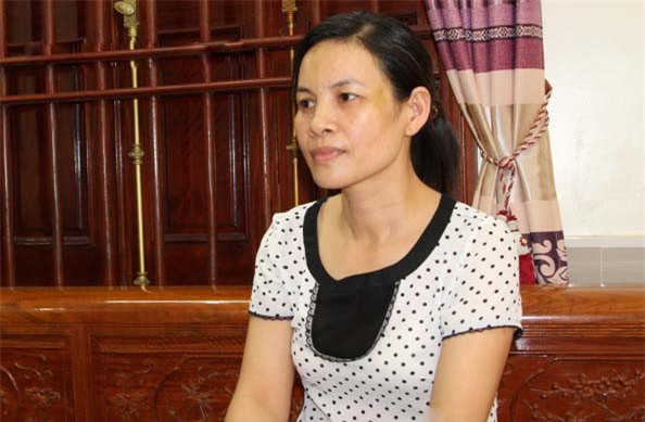 Bat 2 nguoi dan ong danh nu chu nha xe o Nghe An hinh anh 2