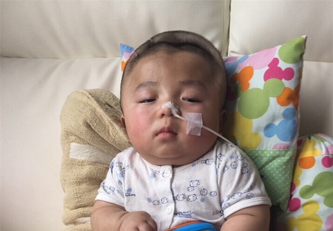 Tin vui: Bé Phạm Đức Lộc được bác sĩ cho về Việt Nam đón sinh nhật một tuổi - Ảnh 1.