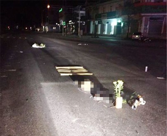 Bàng hoàng phát hiện một phụ nữ chết loã thể giữa đường - Ảnh 1.