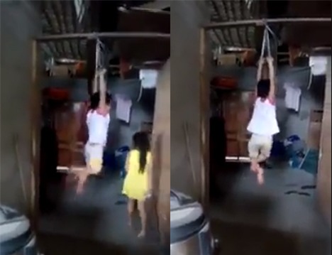 Phẫn nộ đoạn clip bé trai bị buộc 2 tay khóc thét giãy dụa trên kèo nhà - Ảnh 3.