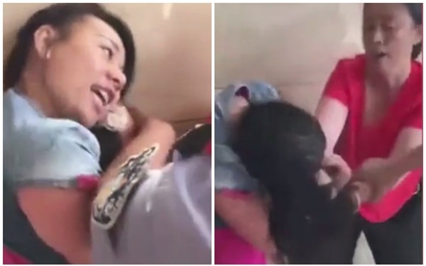 Vợ túm tóc, đạp vào vùng kín bồ nhí của chồng mặc cảnh sát can ngăn - Ảnh 2.