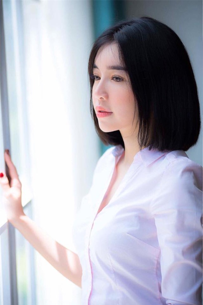 bat ngo truoc hinh anh ba me 2 con elly tran toc ngan tre trung nhu gai 18 - 7