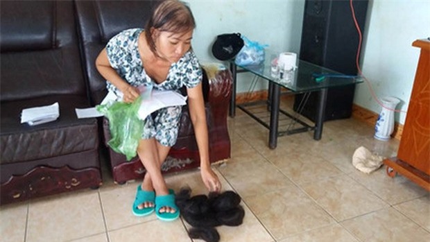 Tranh chấp đất đai, đổ nước chứa thuốc diệt cỏ vào miệng một phụ nữ - Ảnh 2.