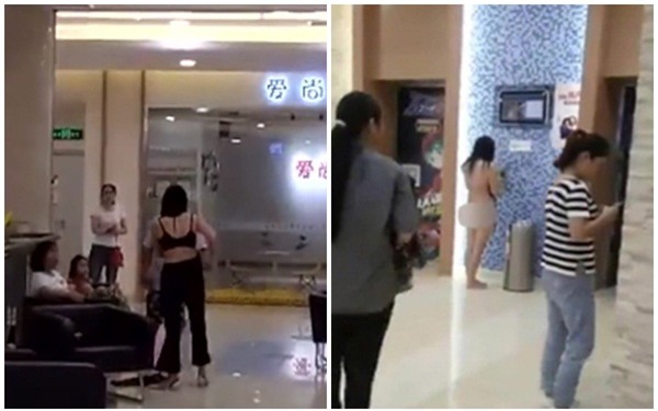 Lý do gây sốc khiến người phụ nữ cởi sạch đồ trước mặt chồng cũ giữa trung tâm thương mại - Ảnh 1.