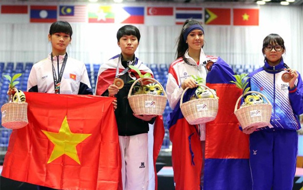 Vẻ đẹp lai của hot girl Taekwondo Campuchia gây sốt tại SEA Games 29 - Ảnh 2.