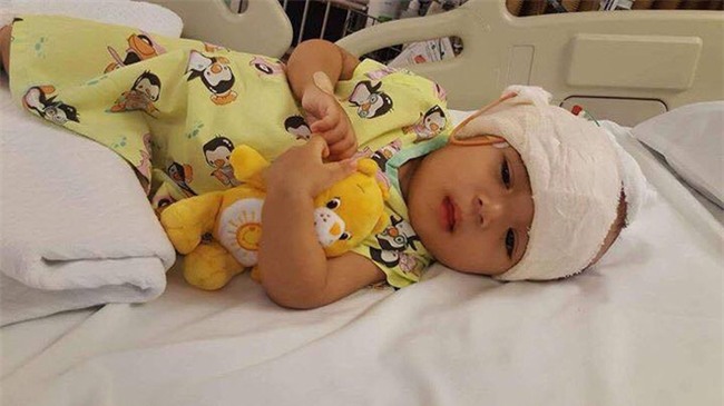 Lời kêu cứu của người vợ bị chồng bỏ rơi, con bệnh não úng thuỷ mấy lần chết hụt khi qua Singapore điều trị - Ảnh 4.