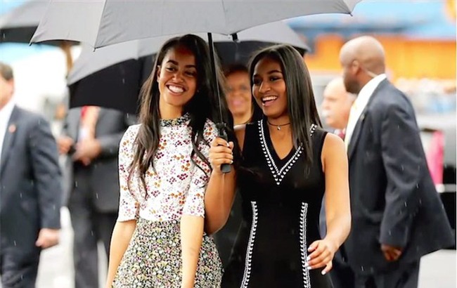 Nói không với tivi và đi ngủ lúc 8h tối - Hai nguyên tắc dạy con của vợ chồng Obama - Ảnh 1.