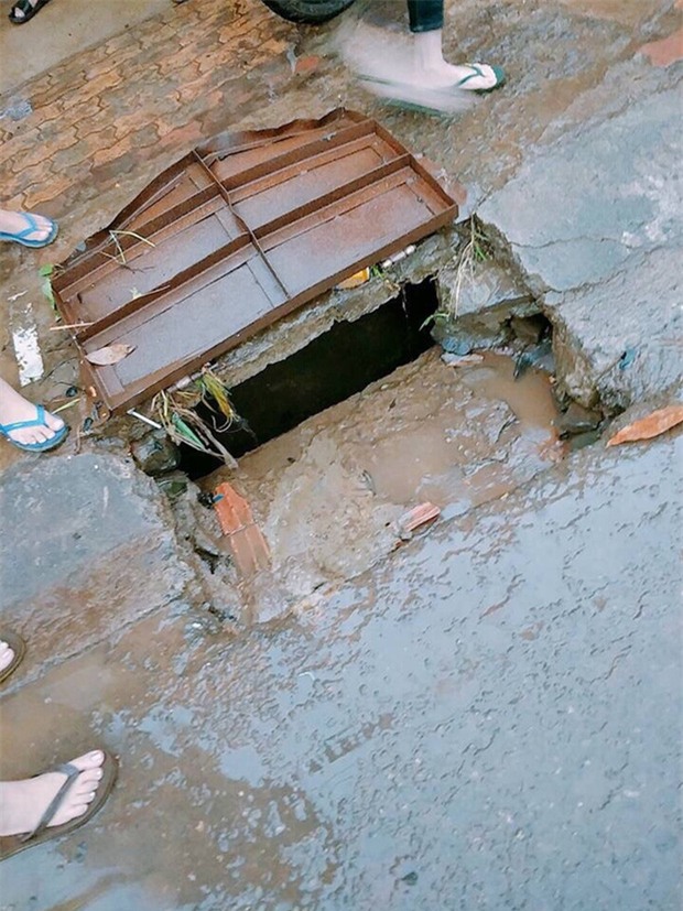 Tìm thấy thi thể nữ sinh bị nước cuốn trôi xuống cống - Ảnh 1.