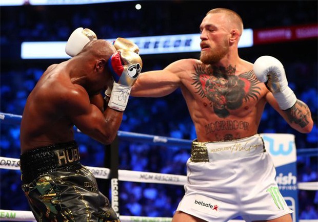 Mayweather không đấm gục McGregor vì sợ đối thủ vỡ não - Ảnh 1.