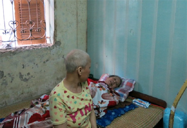 vo ung thu vu chap nhan dong bim o nguc de duy tri su song cho chong - 2