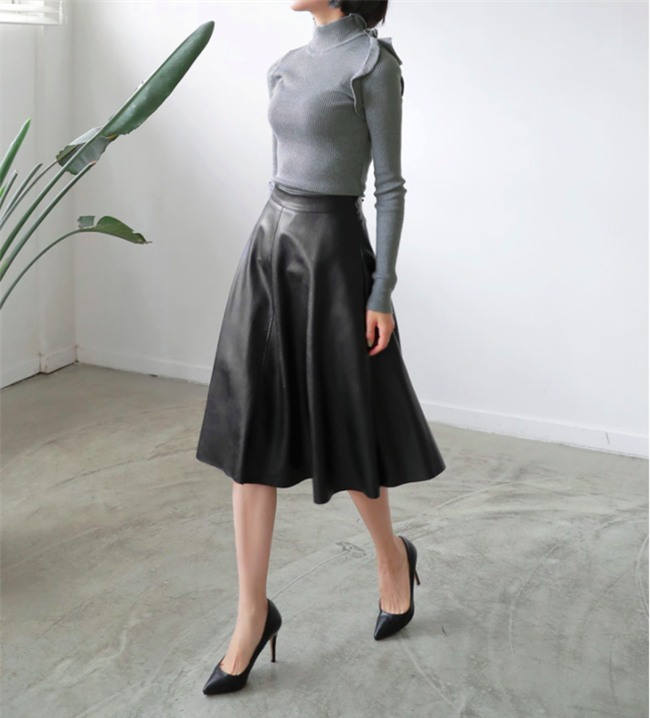 Lên đồ ấm áp cho ngày trời lạnh tăng cường với 4 kiểu chân váy chuyên dụng của mùa đông - Ảnh 14.