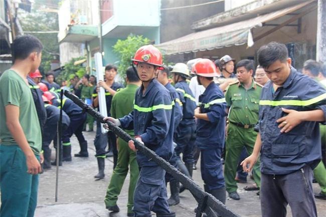 tp.hcm: nha boc chay nghi ngut luc rang sang, me va 2 con gai chet thuong tam - 1