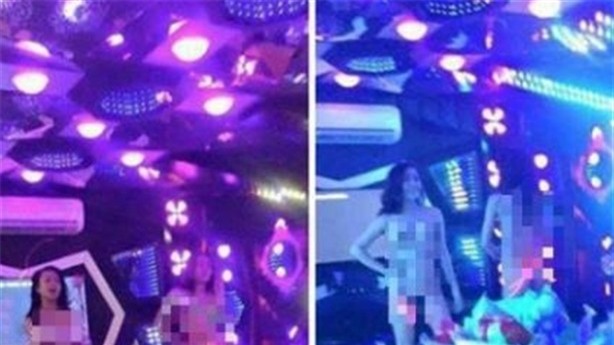Nữ tiếp viên quán karaoke khỏa thân, tắm bia mua vui cho khách