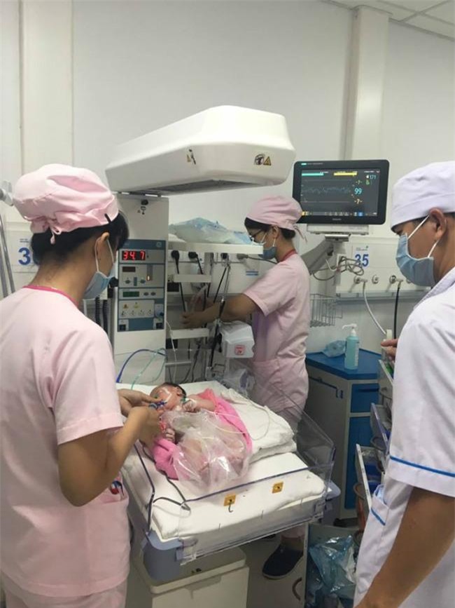 tp.hcm: phep mau ky dieu den voi be gai vua chao doi co ruot, gan o ngoai thanh bung - 2