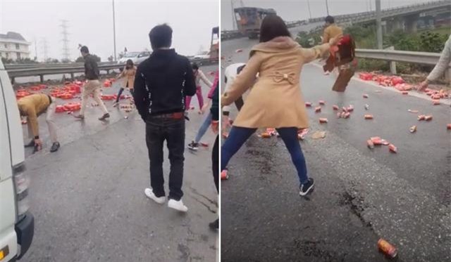 hinh anh dep: xe tai cho coca bi do, hang chuc nguoi xum lai giup tai xe - 2