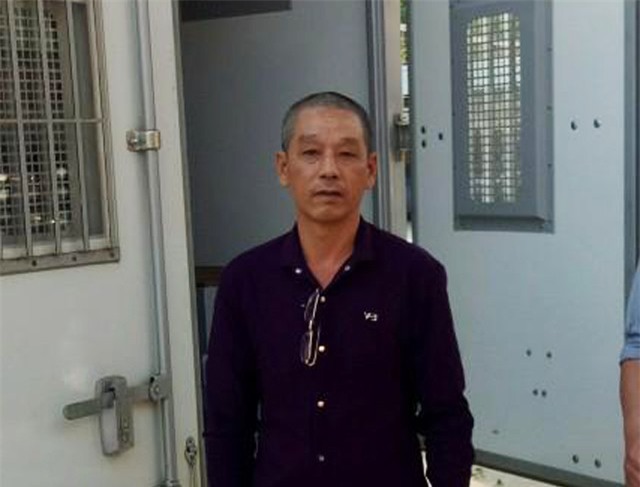 Truy bắt thành công đối tượng bỏ trốn, lấy vợ và sinh con gần 26 năm về quy án - Ảnh 1.