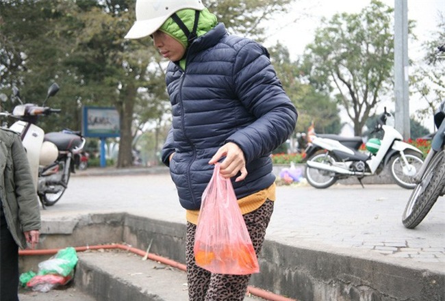 Hà Nội: Sợ đông đúc nhiều gia đình tiễn Táo Quân về trời sớm - Ảnh 2.