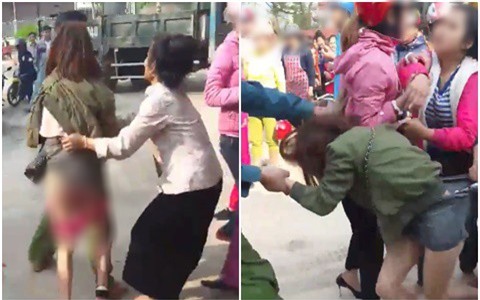 Clip cô gái trẻ bị nhóm người túm tóc, lột quần giữa đường nghi đánh ghen gây xôn xao - Ảnh 1.