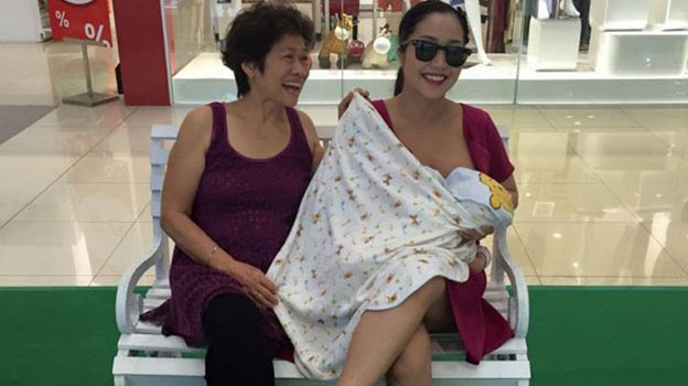 Ốc Thanh Vân vô tư cho con bú mọi lúc mọi nơi