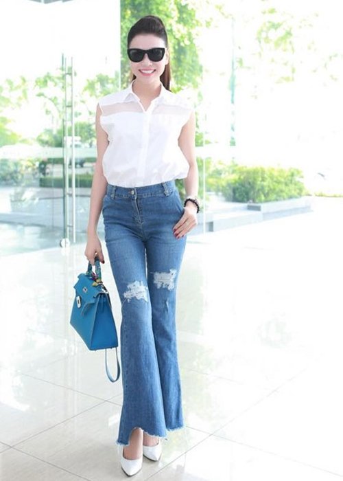 Quần ống vẩy cạp cao giúp kéo dài đôi chân, tạo cảm giác thân hình thon thả hơn - Trà Ngọc Hằng với trang phục dạo phố