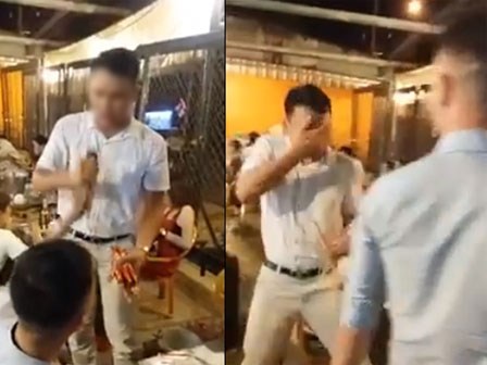 Clip: Nam thanh niên cướp mic, hất cốc bia vào người hát rong gây tranh cãi