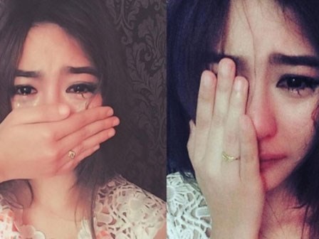 Bất ngờ với gương mặt thật của cô gái vừa che mặt vừa khóc