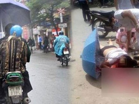 Đừng bao giờ che ô khi đang điều khiển xe máy, đây là nguyên nhân