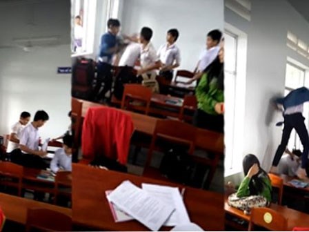 Sốc: Nam sinh cấp 3 cầm gậy phi lên bàn đánh bạn cùng lớp nhưng không ai can ngăn