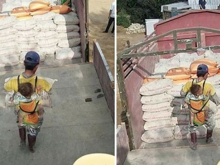 Khoảnh khắc ông bố vừa địu con, vừa bốc vác xi măng mưu sinh làm vạn người rơi nước mắt