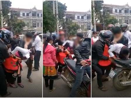 Cô gái bị kéo tuột váy vì nhóm thanh niên đi